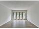 Spacious living room with modern flooring and sliding doors to balcony at 3650 Ashford Dunwoody Rd, Ne, #923 # 923, Atlanta, GA 30319
