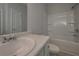 This bathroom features a white vanity, a toilet, and a shower and bathtub combo at 490 Charleston Pl, Villa Rica, GA 30180