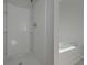 Bathroom showcasing a separate tub and walk-in shower design, offering optimal relaxation at 490 Charleston Pl, Villa Rica, GA 30180