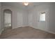 An open floor plan showing white doors, neutral walls, and light-colored wood floors at 490 Charleston Pl, Villa Rica, GA 30180