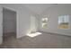 Large main bedroom featuring large windows, vaulted ceilings and attached walk-in closet at 490 Charleston Pl, Villa Rica, GA 30180