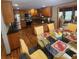 Open kitchen with granite countertops, stainless steel appliances, and an adjacent dining area at 976 Bakers Bridge Rd, Douglasville, GA 30134