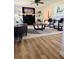 Inviting living room with light, airy design, featuring modern decor and a cozy fireplace at 112 Village Ct, Woodstock, GA 30188