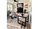 Bright living room featuring contemporary furniture, stylish rug, and a decorative fireplace at 112 Village Ct, Woodstock, GA 30188