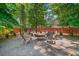 Inviting backyard with a gravel area and outdoor seating around a fire pit, perfect for gatherings at 3146 Frontenac Ne Ct, Atlanta, GA 30319