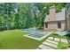 Backyard pool with lounge seating and lush landscaping. Perfect for summer fun at 3146 Frontenac Ne Ct, Atlanta, GA 30319