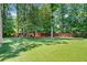 Lush backyard featuring well-maintained grass and mature trees. Great for outdoor activities at 3146 Frontenac Ne Ct, Atlanta, GA 30319