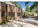Brick two-car garage with ample driveway space and an automatic gate, offering convenience and security at 3146 Frontenac Ne Ct, Atlanta, GA 30319
