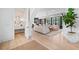 Bright living room with hardwood floors, modern lighting, and an open concept design at 3146 Frontenac Ne Ct, Atlanta, GA 30319