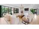 Spacious living room with comfortable seating, fireplace, and seamless access to the backyard at 3146 Frontenac Ne Ct, Atlanta, GA 30319