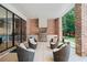 Cozy outdoor kitchen with stainless steel grill, brick accents, and comfortable seating at 3146 Frontenac Ne Ct, Atlanta, GA 30319