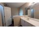 Bathroom with large mirror, sink and cabinets at 3679 Seabass Rd, Decatur, GA 30034