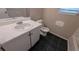 The bathroom features a vanity, sink, and toilet at 3679 Seabass Rd, Decatur, GA 30034