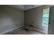 A bedroom with a trey ceiling and a window at 3679 Seabass Rd, Decatur, GA 30034