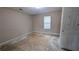 Bedroom features a window and ample natural light at 3679 Seabass Rd, Decatur, GA 30034