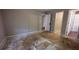 Bedroom with bare plywood floors, awaiting flooring, multiple doorways present at 3679 Seabass Rd, Decatur, GA 30034