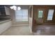 Dining room with tile flooring, white walls and white blinds at 3679 Seabass Rd, Decatur, GA 30034