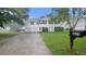 Two-story home with vinyl siding, two-car garage with a mailbox with the number 3679 at 3679 Seabass Rd, Decatur, GA 30034
