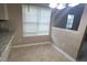 Eat in kitchen featuring light granite countertops and a sunny window at 3679 Seabass Rd, Decatur, GA 30034