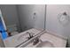 Bathroom featuring a double sink vanity and large mirror at 6385 Southland Forest Dr, Stone Mountain, GA 30087