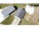 Aerial view showing carport with camper, storage building with fence and a shed at 13 Cliff Ct, Villa Rica, GA 30180