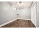 Charming bedroom featuring hardwood floors, ceiling fan, and large closet for ample storage space at 13 Cliff Ct, Villa Rica, GA 30180