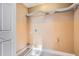 Practical laundry area with ample storage, providing a clean and functional space for household tasks at 13 Cliff Ct, Villa Rica, GA 30180