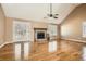 Spacious living room with fireplace, hardwood floors, and natural light at 13 Cliff Ct, Villa Rica, GA 30180