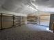 Spacious shed interior with gravel floor and metal shelving for optimal storage at 13 Cliff Ct, Villa Rica, GA 30180