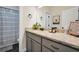 Stylish bathroom with granite countertops and modern fixtures at 220 Alcovy Reserve Way, Covington, GA 30014