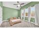 Light-filled bedroom with plush carpet, neutral tones, and ample natural light at 220 Alcovy Reserve Way, Covington, GA 30014