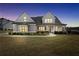 Attractive two-story house with a well-kept lawn and inviting curb appeal at 220 Alcovy Reserve Way, Covington, GA 30014