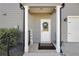 Charming front porch with stylish columns, welcoming decor, and a well-maintained entrance at 220 Alcovy Reserve Way, Covington, GA 30014