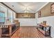 Bright living room with hardwood floors, wainscoting, and a large window providing lots of natural light at 220 Alcovy Reserve Way, Covington, GA 30014