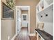Mudroom features bench with storage, hooks, and a calendar at 220 Alcovy Reserve Way, Covington, GA 30014