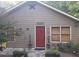 Quaint home with a red door and decorative star, exuding rustic charm and curb appeal at 2363 Paul Nw Ave, Atlanta, GA 30318