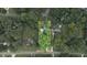 Aerial view of property with boundaries showing location within a wooded neighborhood at 1880 Doefield St, Canton, GA 30115
