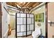 Unfinished basement bathroom features a toilet, privacy screen, and storage at 1880 Doefield St, Canton, GA 30115