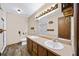 Updated bathroom featuring double sinks, new light fixtures and large marble shower at 1880 Doefield St, Canton, GA 30115