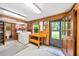 Efficient laundry room with washer, dryer, sink, storage, and access to the backyard at 1880 Doefield St, Canton, GA 30115