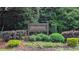Community sign for Deerfield surrounded by lush landscaping at 1880 Doefield St, Canton, GA 30115