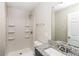 Clean bathroom featuring granite vanity and shower with convenient shelving at 2500 Swallow Circle Southeast Se Cir, Atlanta, GA 30315
