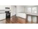 Modern kitchen with stainless steel appliances, granite countertops, and hardwood floors at 2500 Swallow Circle Southeast Se Cir, Atlanta, GA 30315