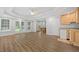 Basement featuring vinyl flooring, french doors leading to back yard, and small bar area at 2738 Riderwood Ne Ln, Marietta, GA 30062