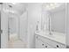 Bright bathroom featuring a white vanity, sink, and a shower with white accents at 2738 Riderwood Ne Ln, Marietta, GA 30062