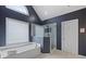Bright bathroom boasts a soaking tub, frameless shower, and large window at 2738 Riderwood Ne Ln, Marietta, GA 30062