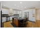 Beautiful kitchen with stainless steel appliances, center island, and white cabinets at 2738 Riderwood Ne Ln, Marietta, GA 30062
