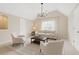 Bright living room with cathedral ceiling, neutral color scheme, and contemporary furnishings at 2738 Riderwood Ne Ln, Marietta, GA 30062