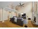 Spacious living room with fireplace, hardwood floors, vaulted ceiling, and open floor plan at 2738 Riderwood Ne Ln, Marietta, GA 30062