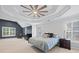 Spacious main bedroom with tray ceilings, large windows and plantation shutters and a luxurious carpet at 2738 Riderwood Ne Ln, Marietta, GA 30062